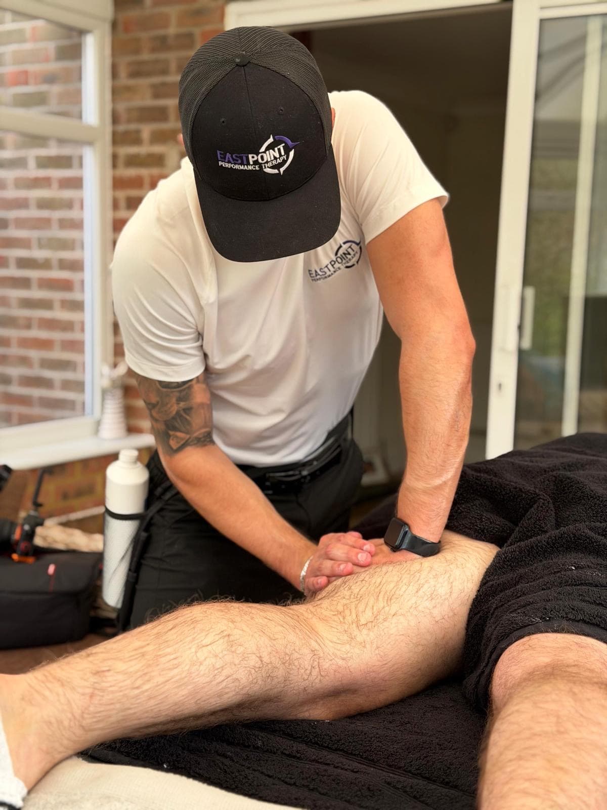 Rob East delivering a sports massage treatment